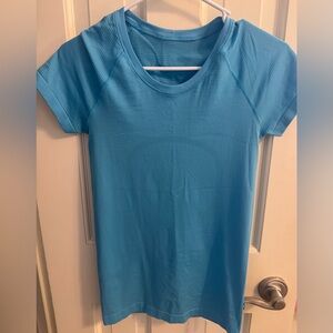 Lululemon Swiftly Tech Hip Length Blue Short Sleeve Top Size 4